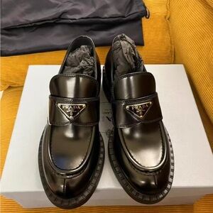 Prada Women's Black Glossy Slip-On Loafers